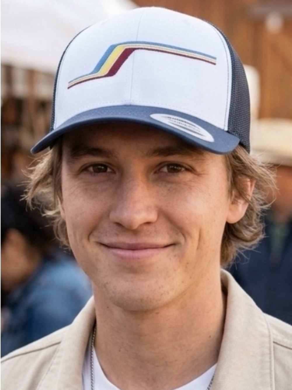 The Classic Navy Trucker Cap with Multicolor Stripe